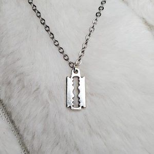 Tiny razor blade necklace.